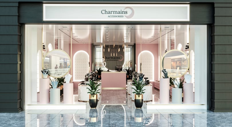 Premium accessory store showroom interior in Istanbul featuring arched illuminated display walls and contemporary brass lighting fixtures