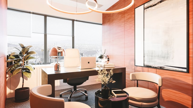 Levent, Istanbul'da ahşap duvar kaplaması, dairesel sarkıt aydınlatma ve rafine oturma düzeniyle sıcak tonlu yönetici ofisi iç mekan tasarımı