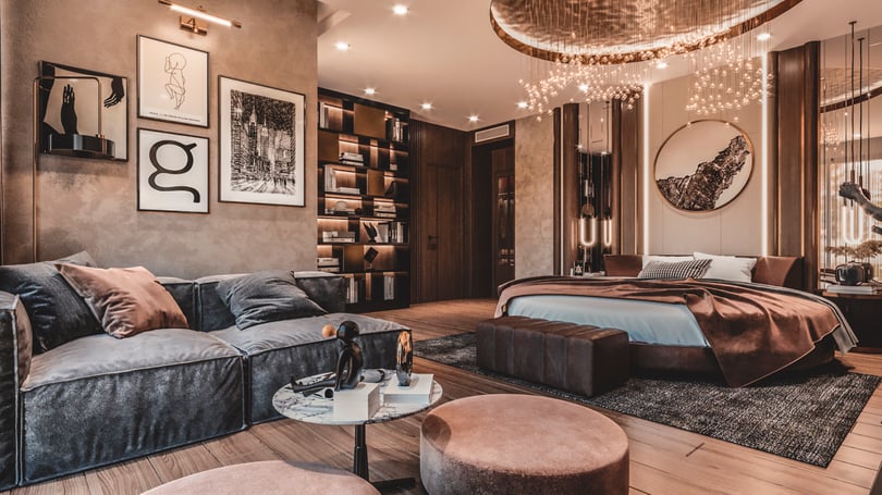 Luxury modern bedroom interior design project in Göktürk, Istanbul featuring a round upholstered bed, custom walnut wall panels, and statement crystal chandelier