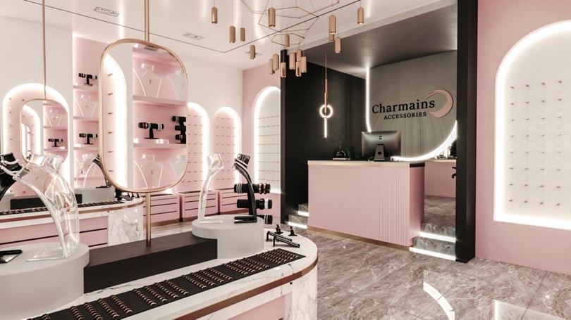 Boutique accessory store design in Istanbul showcasing oval mirrors, brass pendant lighting and premium marble display units at Venezia Mega Outlet