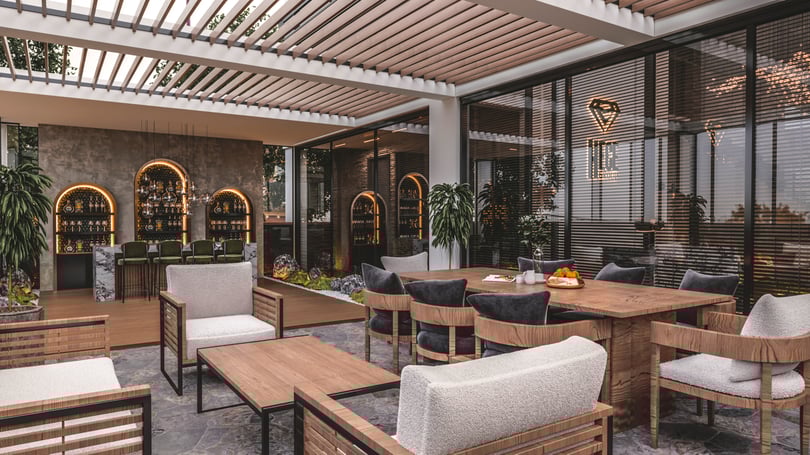 Modern outdoor office lounge with wooden dining table and pergola roof in Yenişehir Mersin interior design project