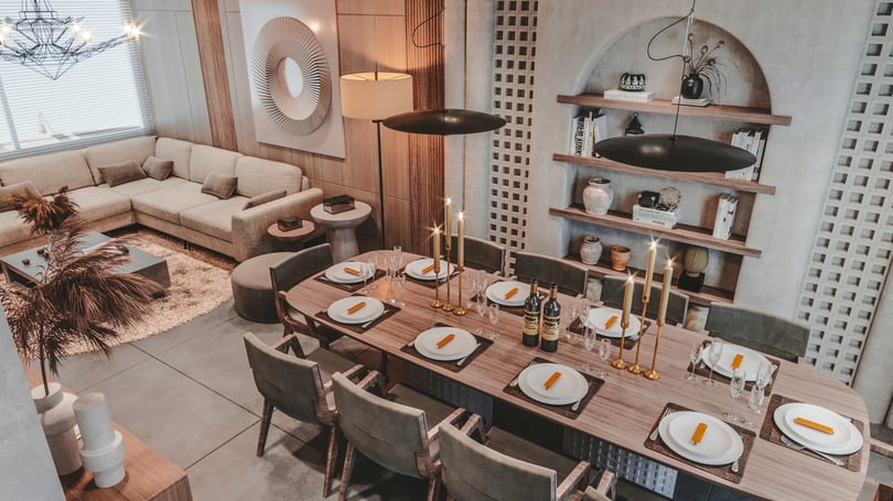 High-end duplex living space in Amsterdam featuring contemporary lounge area, bespoke wood paneling and statement lighting fixtures