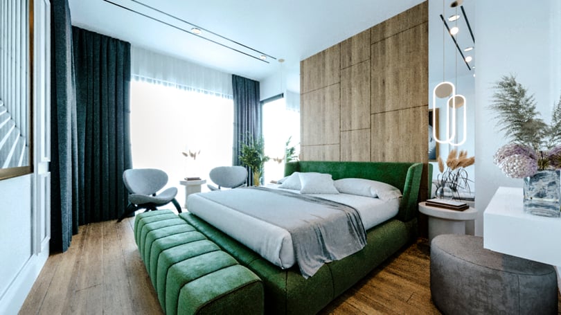 Luxury master bedroom with green upholstered bed and wood panel headboard in Gebze