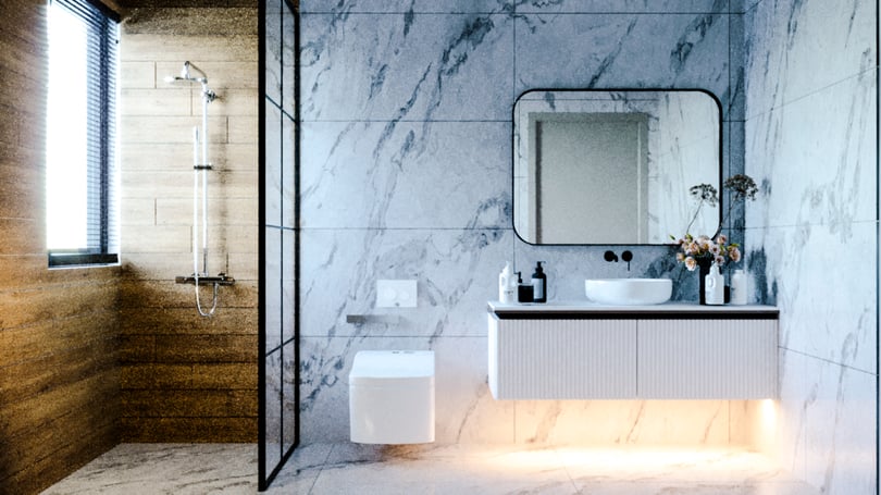Marble bathroom with floating vanity and black framed shower enclosure in Gebze villa