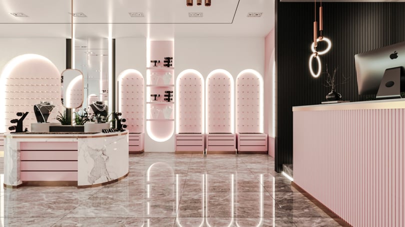 High-end jewelry store interior concept in Istanbul with glossy marble flooring, pink cabinetry and integrated LED lighting design