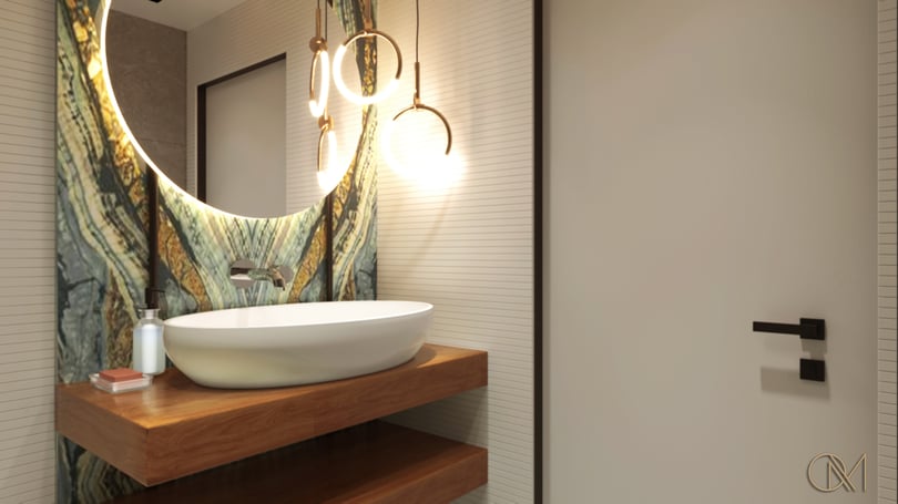 Luxury office bathroom design in Levent Istanbul with marble sink, round backlit mirror and designer pendant lights