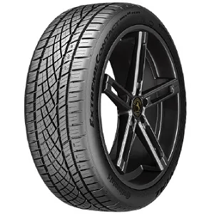 A high-performance car tire with a detailed tread pattern and a black alloy wheel.