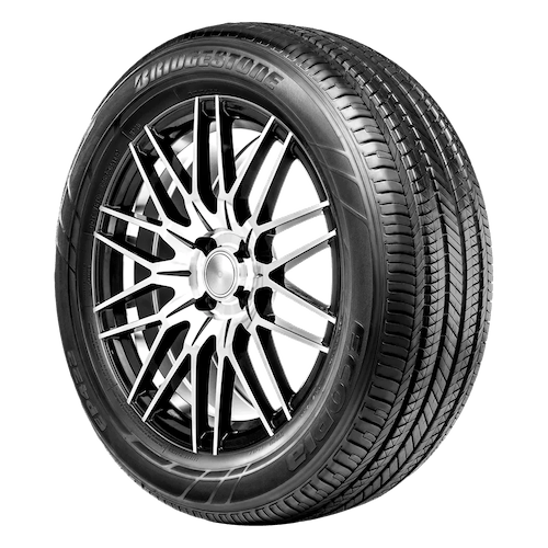 A close-up image of a Bridgestone tire featuring a detailed tread pattern and a metal alloy wheel with a complex, multi-spoke design.