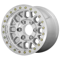 A silver alloy wheel with a series of small bolts around the rim, featuring a spoke design with oval-shaped openings.