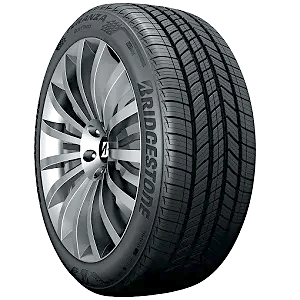 A Bridgestone car tire with a detailed tread pattern and alloy wheel rim.