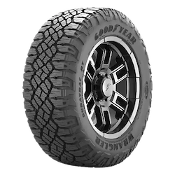 Goodyear Wrangler tire with a rugged, all-terrain tread pattern and distinctive lettering on the sidewall.