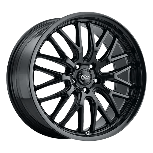 A glossy black multi-spoke car wheel rim with a central logo labeled 'V&ouml;xx'.