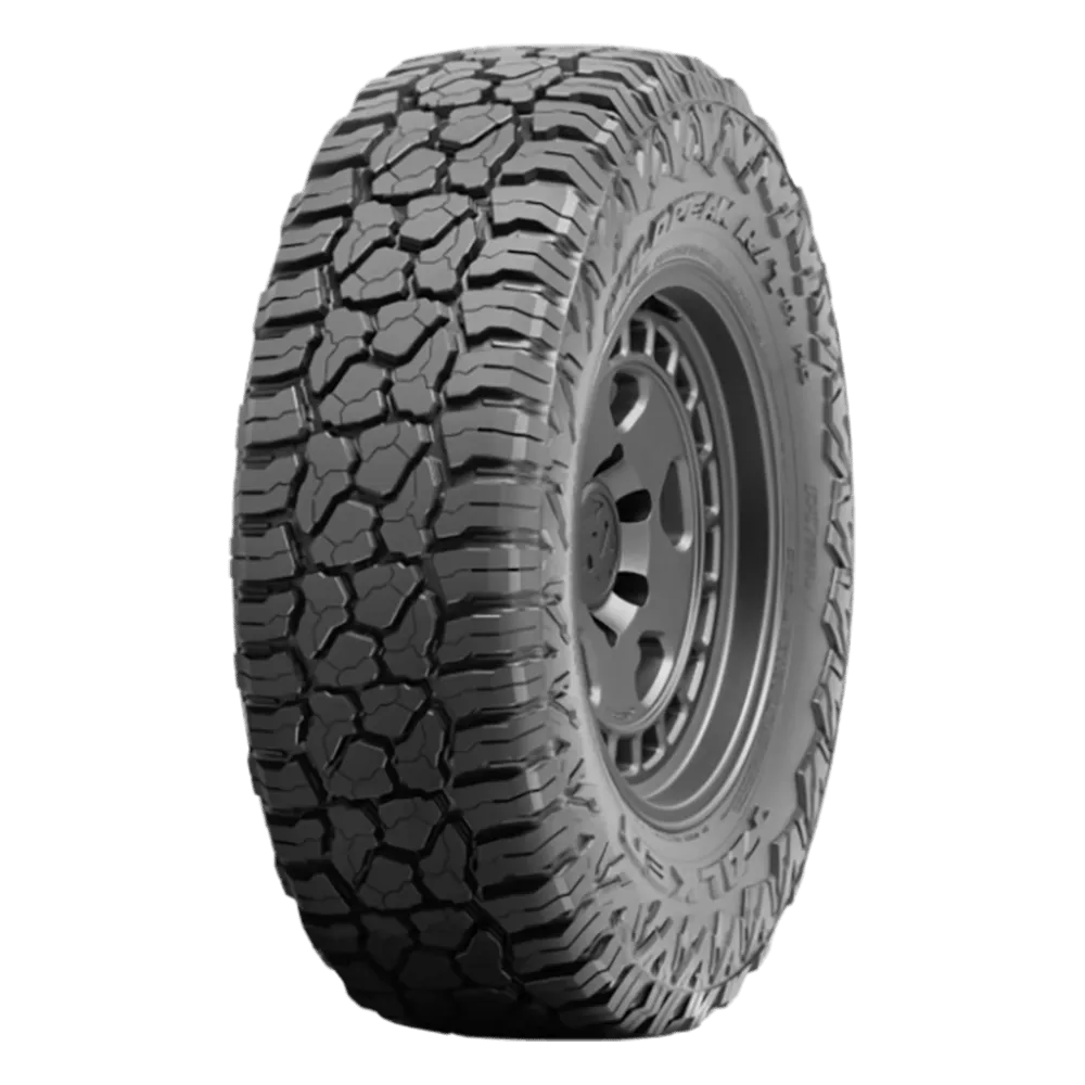 A rugged off-road Falken Wildpeak RT tire with deep treads, designed for traction on rough terrain.