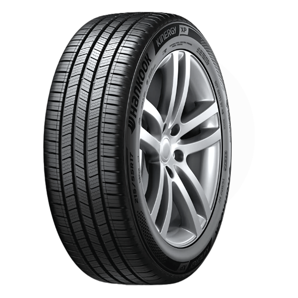 A Hankook Kinergy XP tire with a detailed tread pattern and alloy wheel rim, isolated on a white background.
