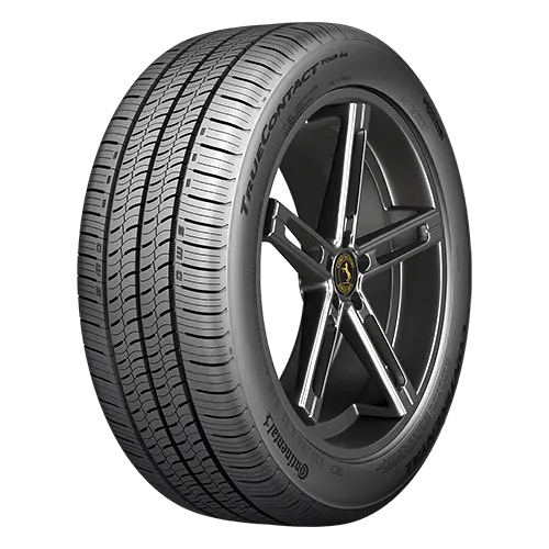 A Continental TrueContact Tour tire with an intricate tread pattern, mounted on a five-spoke alloy wheel.