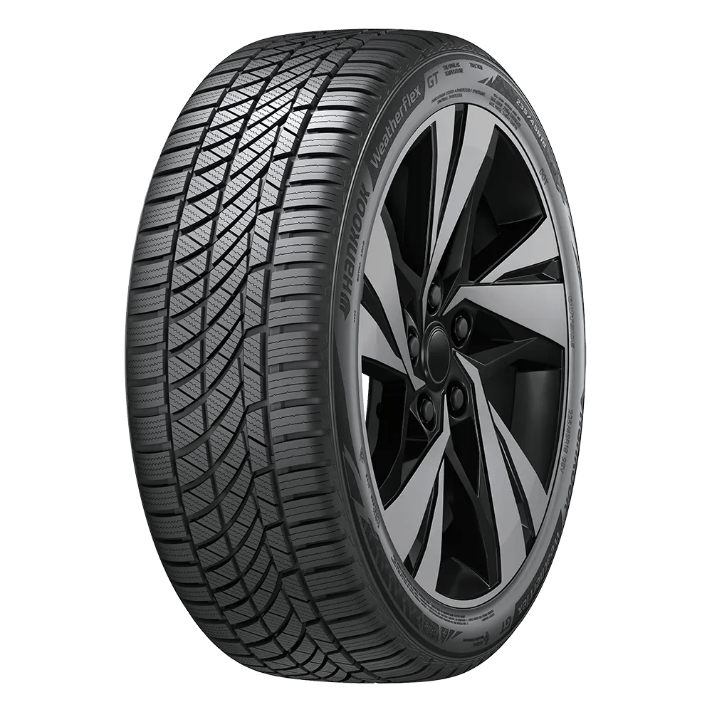 A modern car tire with a detailed tread pattern and a black alloy wheel, labeled "Hankook WeatherFlex GT."
