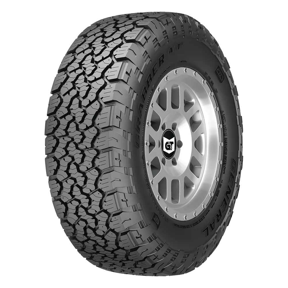 A rugged all-terrain tire with deep tread pattern designed for off-road use, featuring the brand name "General" and model "Grabber AT" on the sidewall.
