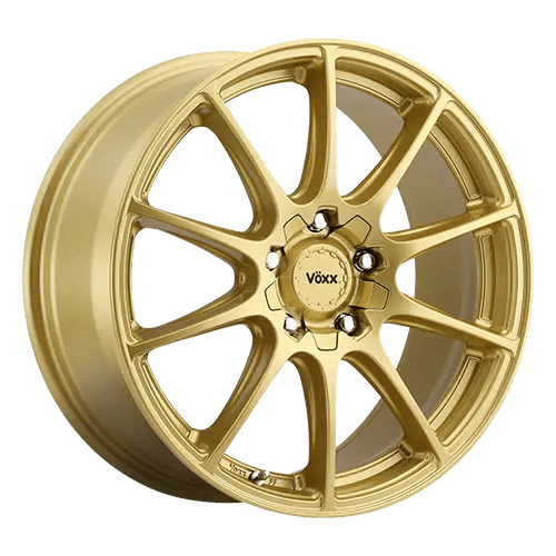 A gold alloy wheel with a multi-spoke design and a central hub featuring the "V&ouml;xx" logo.