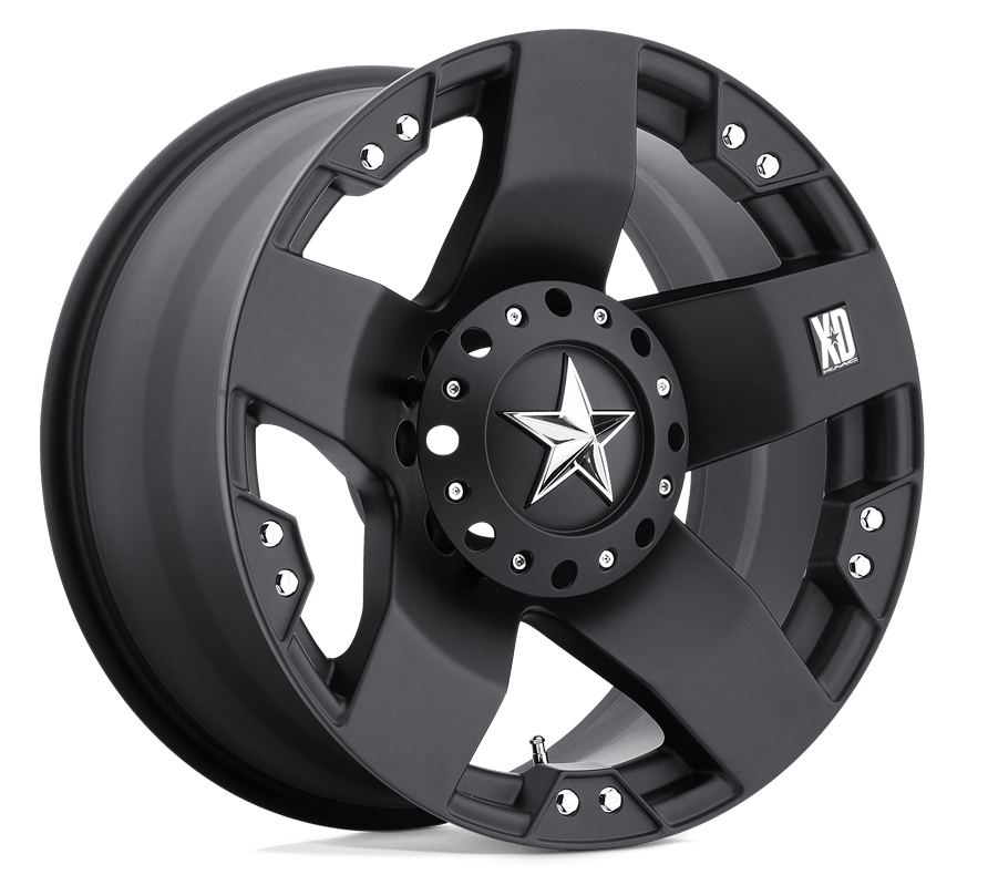 Black alloy wheel with a five-spoke design, featuring a central star emblem and small bolt details, representing the XD brand, model Rockstar.