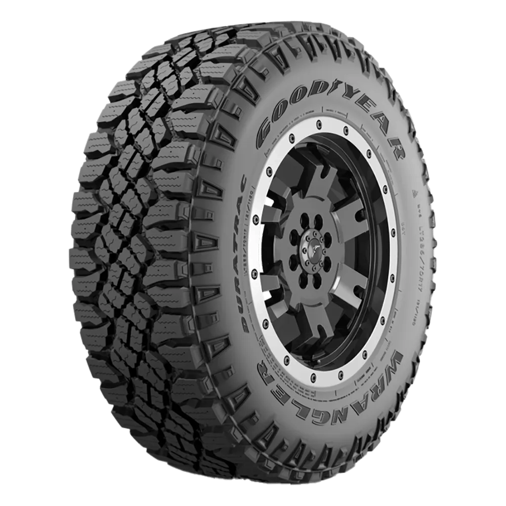 Side view of a Goodyear wrangler duratrac tire on a beadlock-style rim