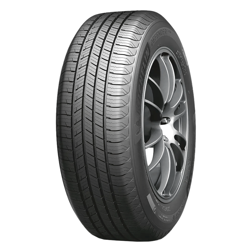 Front view of a Michelin defender T and h tire mounted on an aluminum alloy wheel.