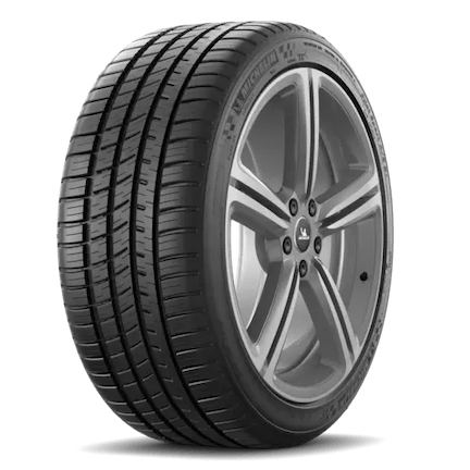 A black Michelin Pilot Sport A/S 3 Plus tire with a detailed tread pattern and a silver alloy wheel rim, displayed at an angle against a plain white background.