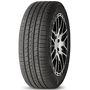 A car tire with a detailed tread pattern and a silver alloy wheel.