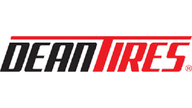 "Dean Tires" logo with the word "Dean" in black and "Tires" in red.