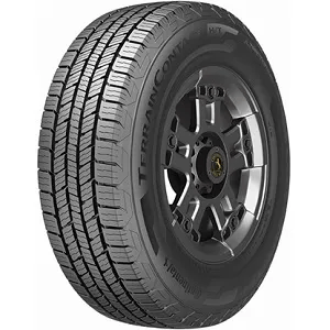 A black Continental TerrainContact H/T tire featuring deep treads and a silver wheel rim, positioned upright against a plain background.
