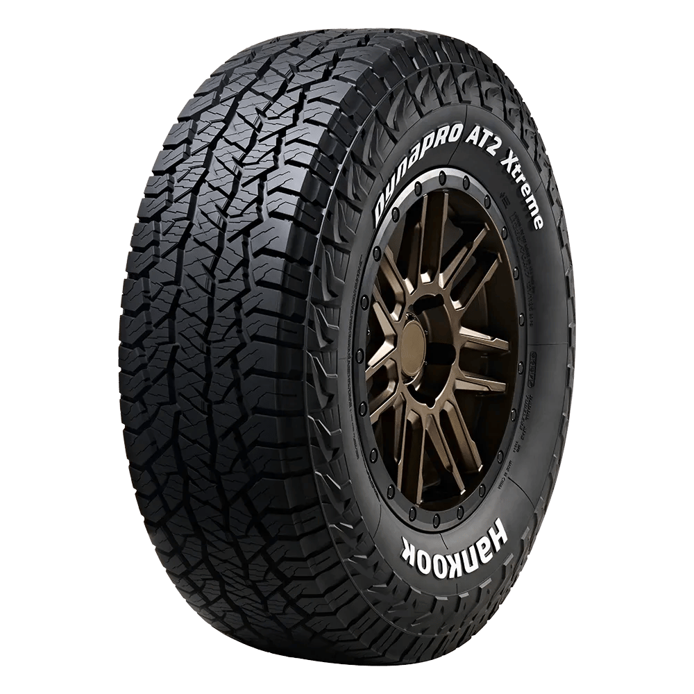 A hankook dynapro tire mounted on a bronze wheel. Hankook dynapro at2 xtreme rf12 an all season all terrain tire for suvs and cuvs