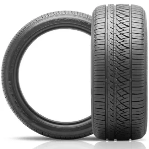 Two Falken Ziex ZE960 AS car tires, one standing upright and the other lying flat, on a white background.