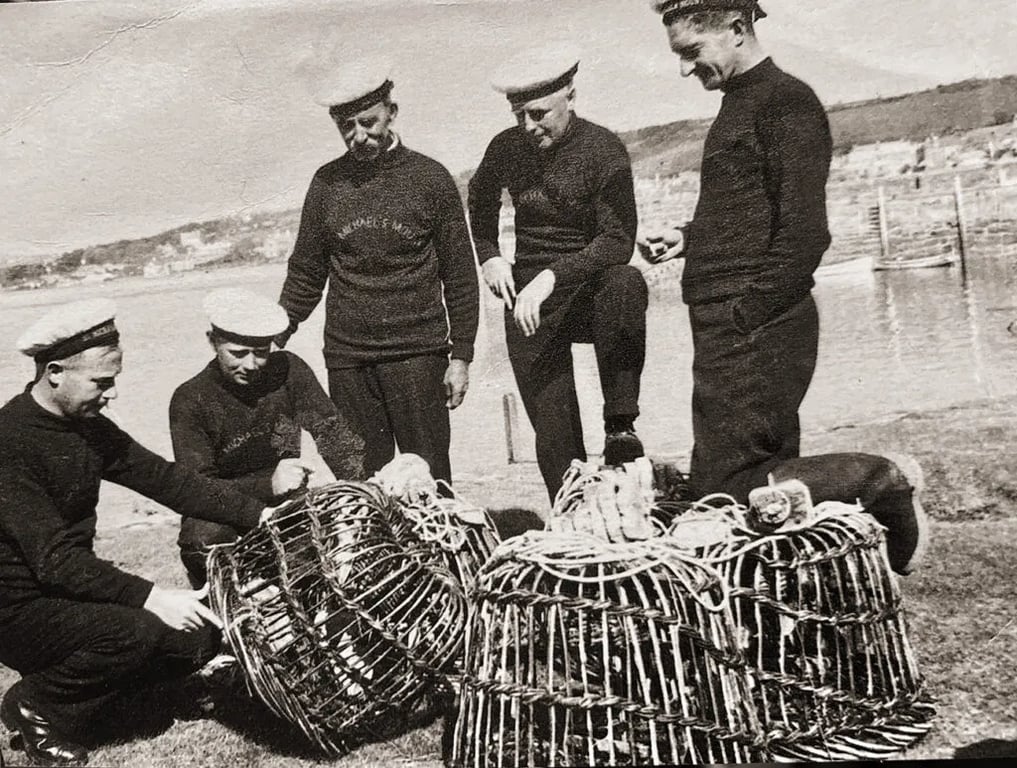Historical photograph of naval personnel with willow lobster pots