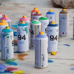 Cans of 94 paint on floor