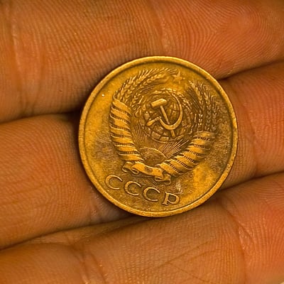 Soviet coins: emblem coin and 5 kopeks (1961) - Image 1 of 2