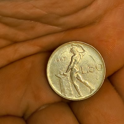1967 L50 coin with a man at an anvil - Image 1 of 1