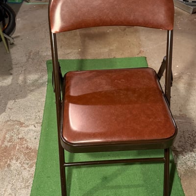 Stacked folding chairs with brown vinyl upholstery - Image 2 of 6
