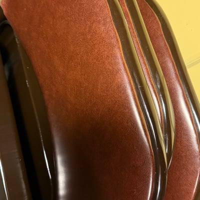Stacked folding chairs with brown vinyl upholstery - Image 5 of 6