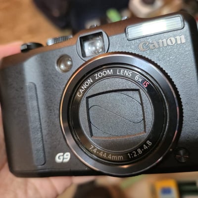 Canon PowerShot S95 digital camera and Canon ZR950 MiniDV camcorder - Image 1 of 4