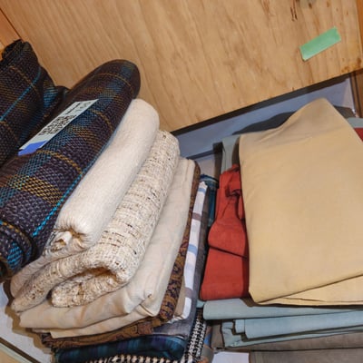 Stacked textiles: blankets, throws, and fabrics - Image 1 of 4