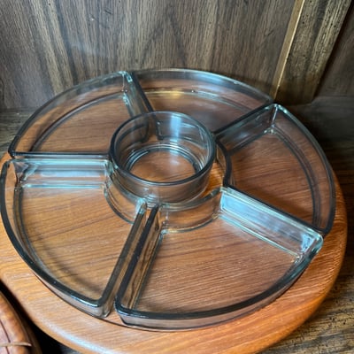 Vintage kitchenware collection: glass segmented serving tray, ceramic pot on burner stand, carved wooden serving piece, and metal scroll trivet - Image 2 of 6