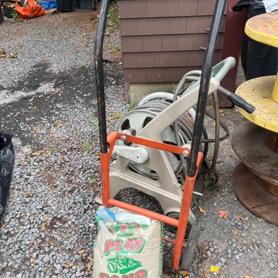Play Sand bag, hose reel, and hand truck - Image 1 of 5