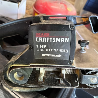 McCulloch chainsaw and Sears Craftsman belt sander with rotisserie kit and safety can - Image 1 of 15