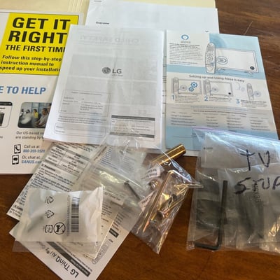 Wall-mounted LG LED TV with mounting hardware, accessories - Image 3 of 5