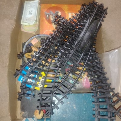 Model railroad track pieces with accessories and monopoly peices  cash - Image 1 of 2