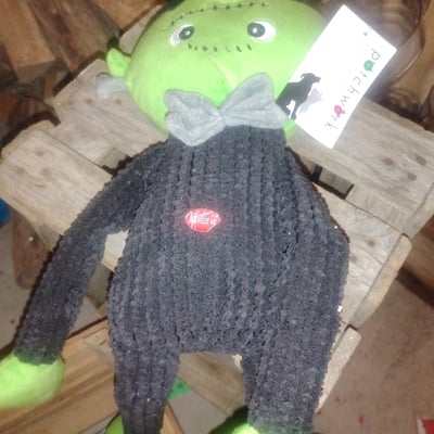 Green plush toy with black knitted body - Image 2 of 2