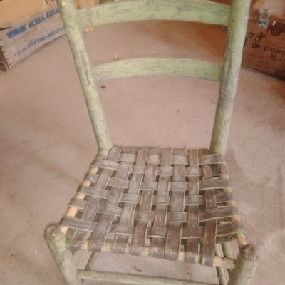 Rustic green woven-seat wooden chair - Image 1 of 2