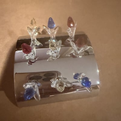 Chrome display stand with glass-stem ornaments - Image 1 of 4