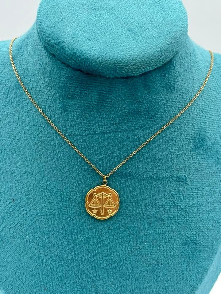 Collier signe du zodiaque en acier inoxydable.