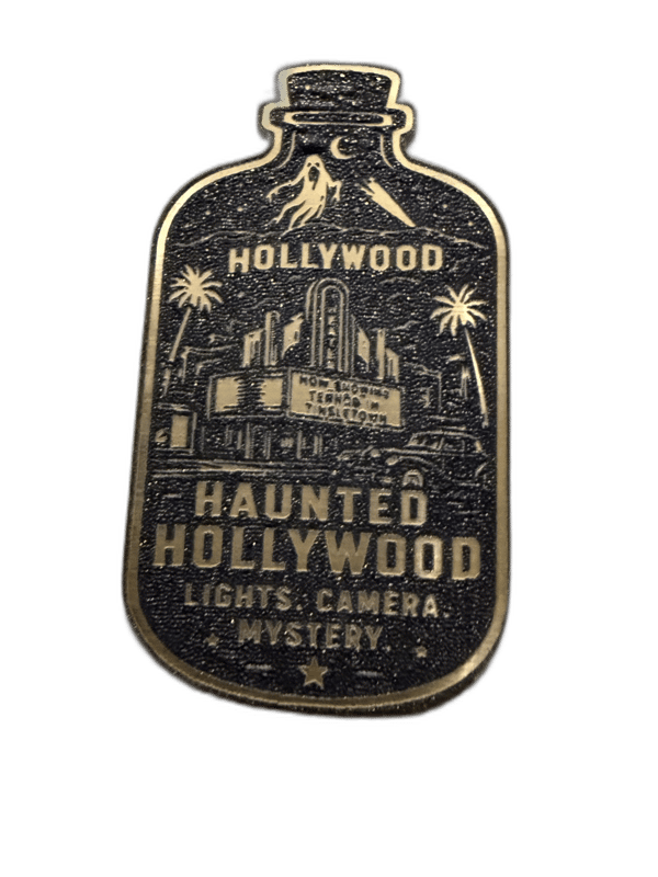 Lost In California Found Adventure bottle-shaped gold emblem with cave and desert scene