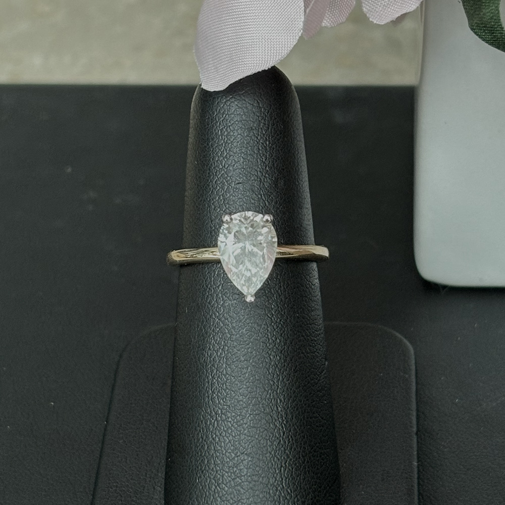 2.25 Tcw Pear Moissanite Colorless Hidden Halo Engagement Ring